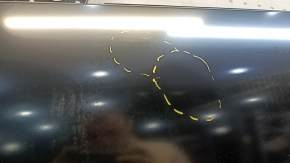 The front left door of a Toyota Prius 50 is bare, 19-22 dents.