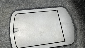 The trunk floor covering of a BMW X7 G07 19-25 without a spare tire, needs cleaning, the foam has peeled off, scratches on the lid