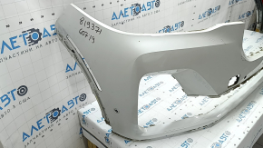 Bare front bumper for BMW X7 G07 19-22 with parking sensors and PMA, white, dented, cracked, broken fasteners, scratches, non-factory holes