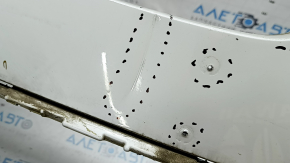 Bare front bumper for BMW X7 G07 19-22 with parking sensors and PMA, white, dented, cracked, broken fasteners, scratches, non-factory holes