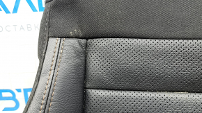 Driver's seat lower trim for a Jeep Compass 23, black leather with perforations and brown stitching, heated, dents, needs cleaning