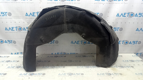 The rear left fender liner of BMW X7 G07 19-24 is torn and dented.