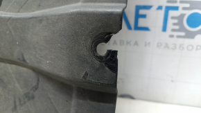 The rear left underbody protection of the BMW X7 G07 19-22 is dented, the fasteners are torn