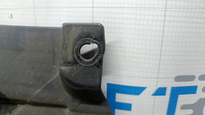 The rear left underbody protection of the BMW X7 G07 19-22 is dented, the fasteners are torn