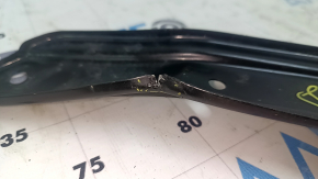 Left radiator bracket for Jeep Compass 23-25 2.0T is dented and cracked.