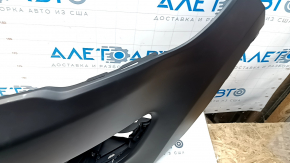 The front bumper, bare upper part of the Jeep Compass 17-21, with a plug, is dented, the plastic is unsoldered.