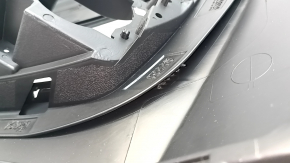The front bumper, bare upper part of the Jeep Compass 17-21, with a plug, is dented, the plastic is unsoldered.