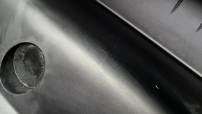The front trunk trough of the 2021-23 Ford Mustang Mach-E is scuffed.