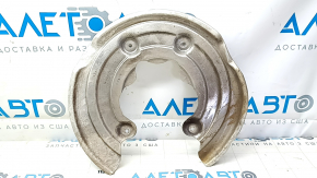 The rear right brake disc cover for a 2021-23 Ford Mustang Mach-E is dented.