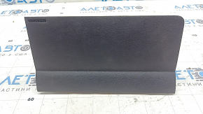 The driver's left knee airbag for the Ford Escape MK3 13-19 is black and has a torn cover.