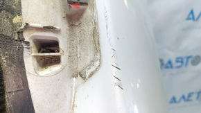 The tailgate is bare, 2013 Ford Mustang Mach-E, white, A3, scratches.