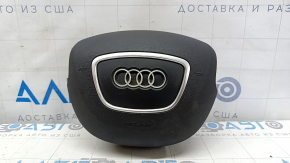 Black steering wheel airbag for the driver's side of the Audi Q5 8R 13-17, with chrome accents, ready for dry cleaning.