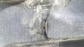 The front right underbody protection of a 2023 Hyundai Sonata is worn out.