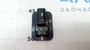 The right tailgate license plate light for a 2021-23 Ford Mustang Mach-E has a broken mount.