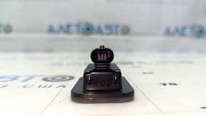 The left tailgate license plate light for a 2021-23 Ford Mustang Mach-E has a broken mount.