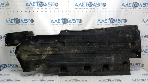 The right underbody protection of a Lincoln MKZ 13-20 is torn.