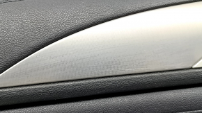 Black rear left door panel for a 17-20 Lincoln MKZ, with leather insert, black leather armrest, under tweeter, under speaker, with chrome molding, dent, scratches on molding
