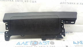 Tesla Model Y 20-25 passenger right knee airbag with black trim, scratched