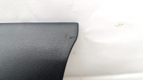 Tesla Model Y 20-25 passenger right knee airbag with black trim, scratched