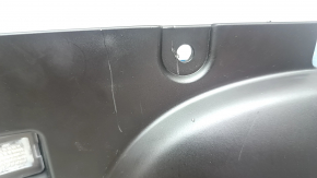 Tesla Model Y 20-25 black driver's footwell lower dash trim, scratches