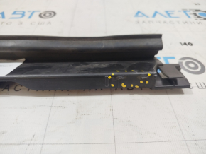 The upper radiator deflector on a 2021-2025 Ford Bronco Sport has a broken mount.