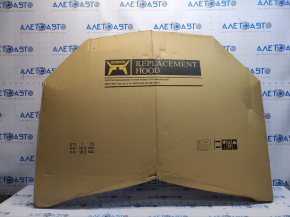 The hood of a Mazda CX-5 13-16 is bare steel, with dents and a bump.