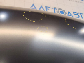 The hood of a Mazda CX-5 13-16 is bare steel, with dents and a bump.