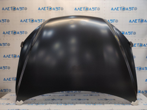 The hood of a Mazda CX-5 13-16 is bare steel, with dents and a bump.