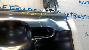The front left door of a Ford Escape MK3, 2013-2019, is bare and dented.
