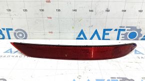 The rear right reflector on a 19-21 VW Jetta has a broken mount.