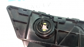 The rear bumper mount, outer right, Tesla Model Y 20-25, is broken.