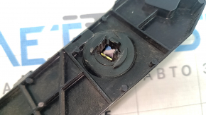 The rear bumper mount, outer right, Tesla Model Y 20-25, is broken.