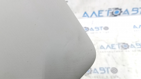 Left sun visor for a VW Jetta 19-24, gray, no hook, no light, dents, needs cleaning