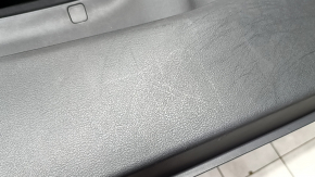 Mazda CX-30 2020 black front left door panel, black cloth insert, black leather armrest with handle, butt, worn