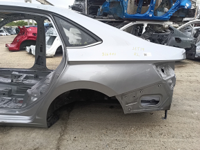 Rear left quarter wing for a 19-24 VW Jetta, silver