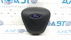 Black, scratched steering wheel airbag for the driver's side of a Ford Fusion mk5 17-20.