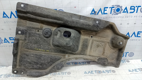 The rear right underbody protection of the Mazda CX-30 20-23 is dented.