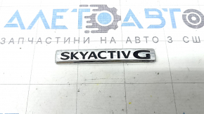 Mazda CX-30 2020 SKYACTIV G emblem on the trunk door, broken guides
