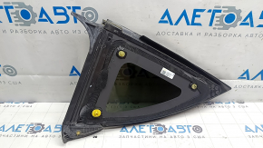 Tesla Model Y 20-25 rear right window with black molding and scratches