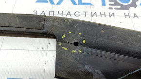 The hood seal on a Ford Fusion mk5 13-20 is torn.