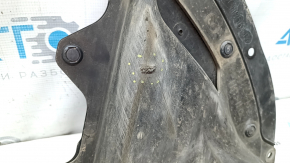 The front left fender liner of the Mazda CX-30 20-23 is worn and broken.
