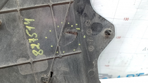 The front left fender liner of the Mazda CX-30 20-23 is worn and broken.
