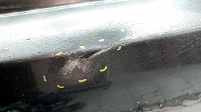 The rear bumper is bare, Toyota Camry v40 07-11 3.5 graphite 1G3, dented, with tears, broken fasteners, and scratches.