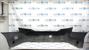The rear bumper is bare, Toyota Camry v40 07-11 3.5 graphite 1G3, dented, with tears, broken fasteners, and scratches.