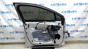 Front left door assembly for Ford Fusion mk5 13-20 hybrid, silver UX, scratches on trim