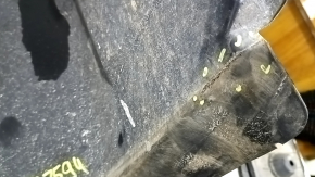 The front right fender liner of a Ford Fusion mk5 17-20 is torn.