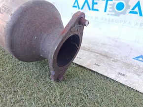 Single-pipe exhaust system for a Ford Fusion mk5 2013-19 2.0 hybrid, plug-in with catalytic converter, rusty, studs sawed off