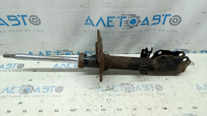 The rear right shock absorber of a Toyota Camry v40 XLE is rusty.