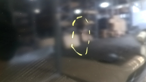The front left door of a Mazda CX-9, 16-23, has a dent and a bump.