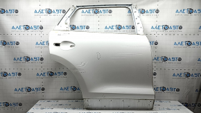The bare rear right door of a Mazda CX-9 16-23 white 25D, bumps, dent
